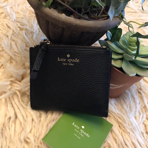 kate spade Handbags - Kate Spade leather mini wallet